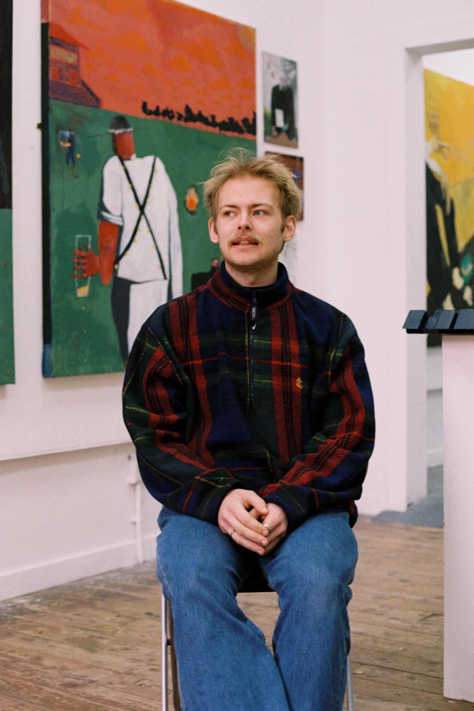 portrait of artist ruaridh lister-campbell in art gallery