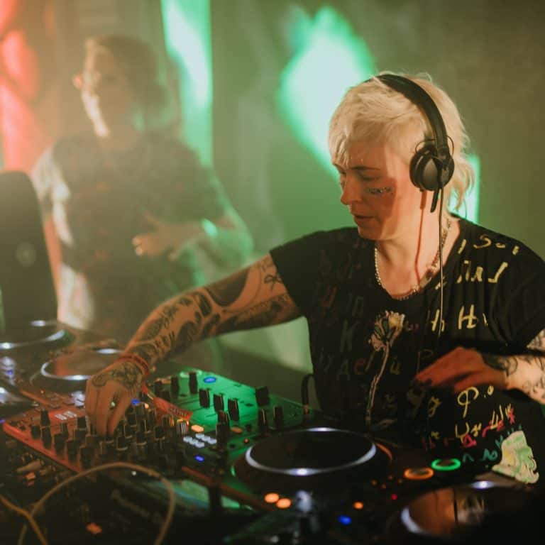 bonzai bonner plays dj set alongside anna gram as lezzer quest on the landing stage at kelburn garden party 2022
