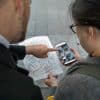 two people play with interactive app made by more fun with games