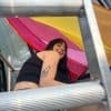 artist Zeena-Wright smiling under ladder